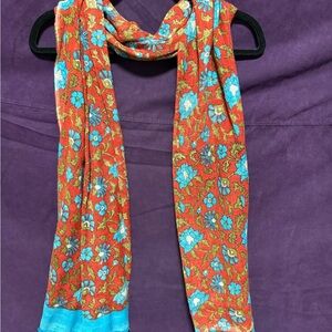 Vibrant Floral Scarf with Red and Blue Accents